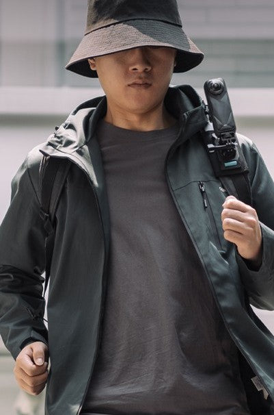 Adjustable shoulder strap camera holder with quick release