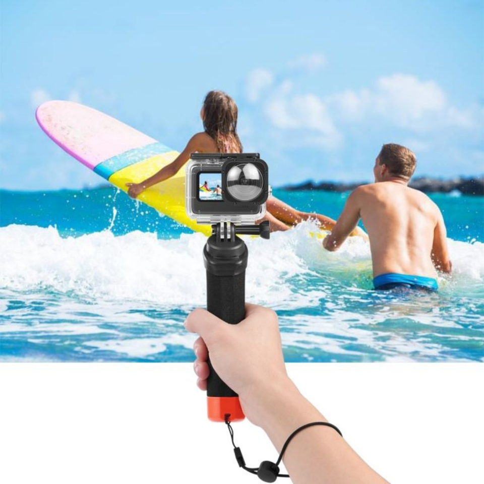 Compact buoyant camera handle for diving, swimming, and travel