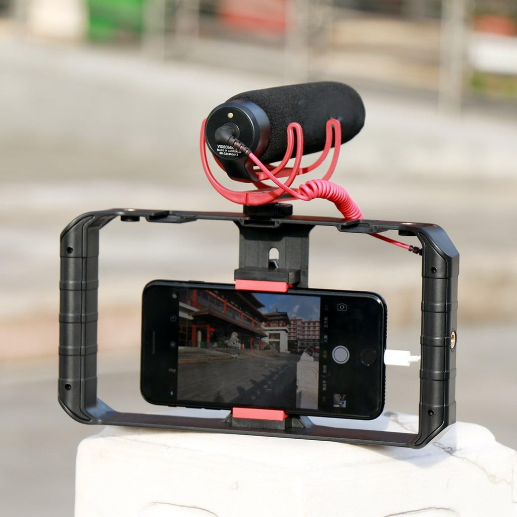 dual grip smartphone stabilizer rig for smooth handheld shots